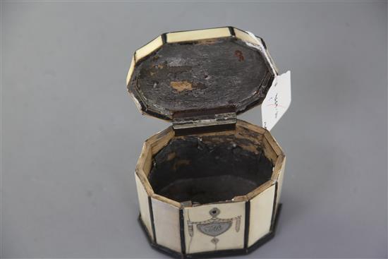 A Regency ten sided inlaid ivory tea caddy, height 4.25in.
